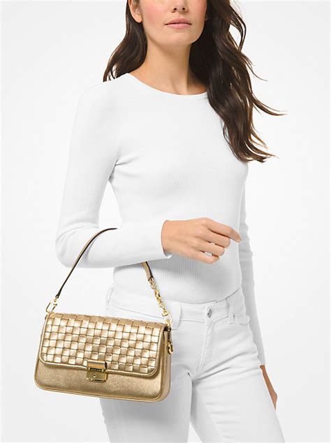 michael kors bradshaw lila|Bradshaw Small Woven Leather Shoulder Bag .